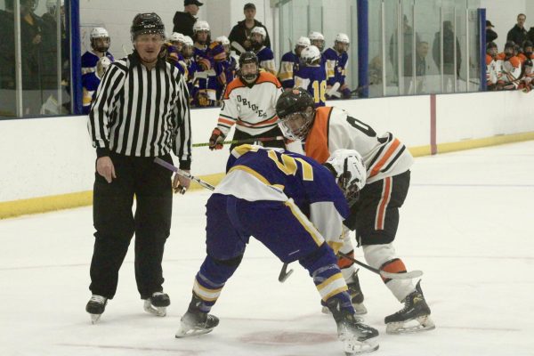 Senior Drew Honie faces off a Chaska player in a standoff Jan. 23. Park took a victory in this game with a score of 7-0.