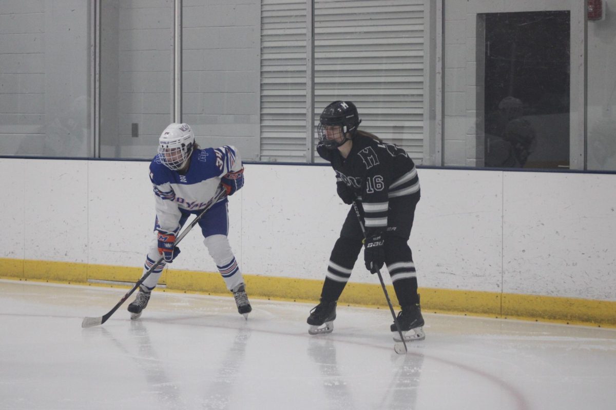 Senior Camryn Witham gets ready for the face off. Hopkins-Park faced Minneapolis and tied 2-2 Jan. 11.