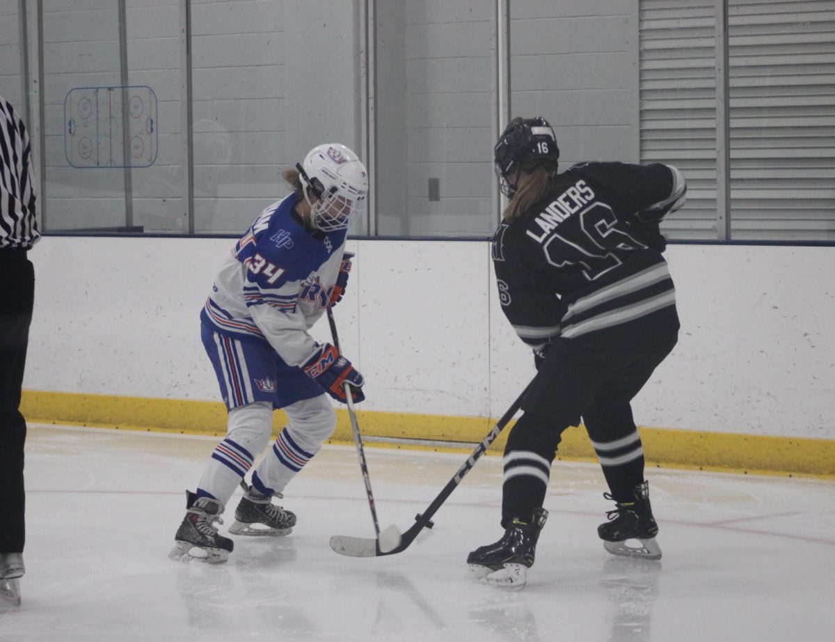 Senior Camryn Witham faces a Minneapolis opponent. Hopkins-Park settled with a 2-2 tie against Minneapolis Jan. 11.
