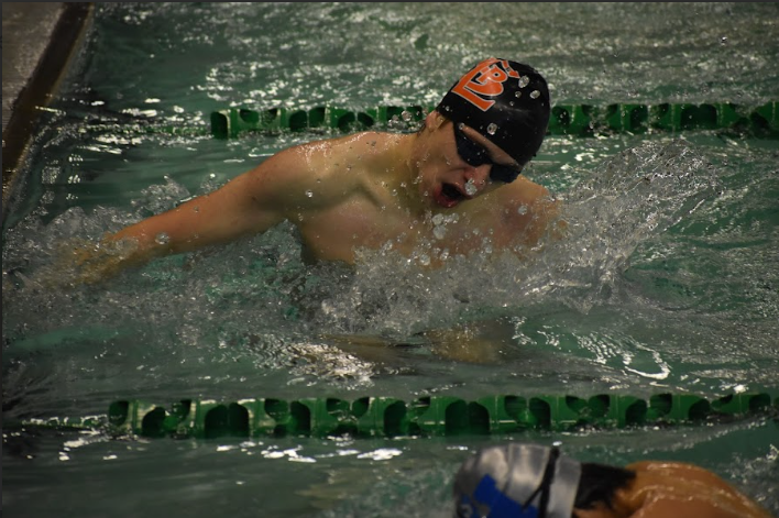 Junior Caleb Teichman swims breaststroke on Jan. 13. Teichman competed as part of a relay on Saturday.