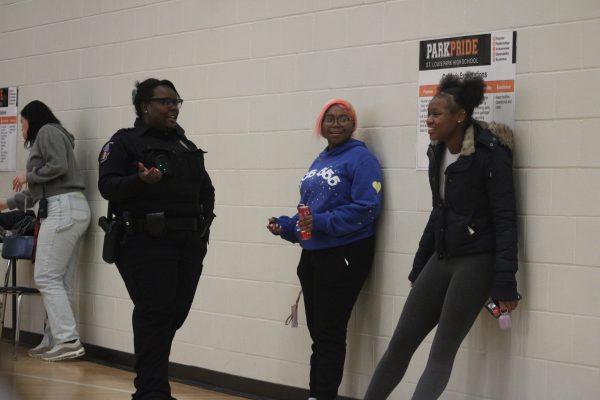 Juvenile response officer Stanikka Alacantara interacts with Park students during lunch Feb. 7. Alacantara attends lunch daily to ensure the safety of students.
