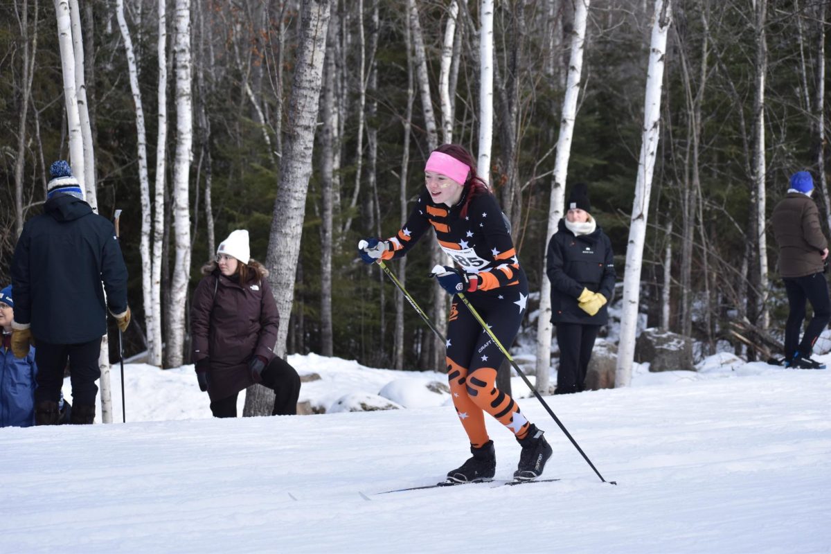 Junior Nora Lindeman skis in the tracks after passing through the technique section on the girls classic-interval qualifier course on Feb 13.