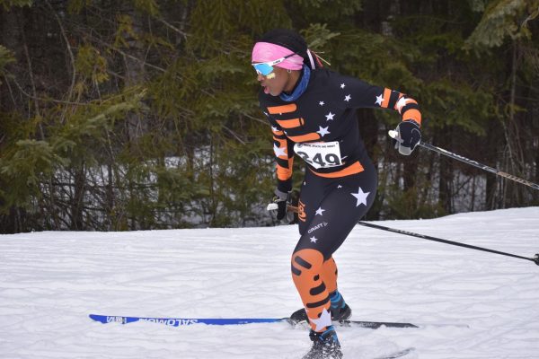 Senior Ayelel Meyen skis up the final hill of her first lap in the girls classic-interval qualifier race. Meyen finished 49th in the qualifier on Feb 13.