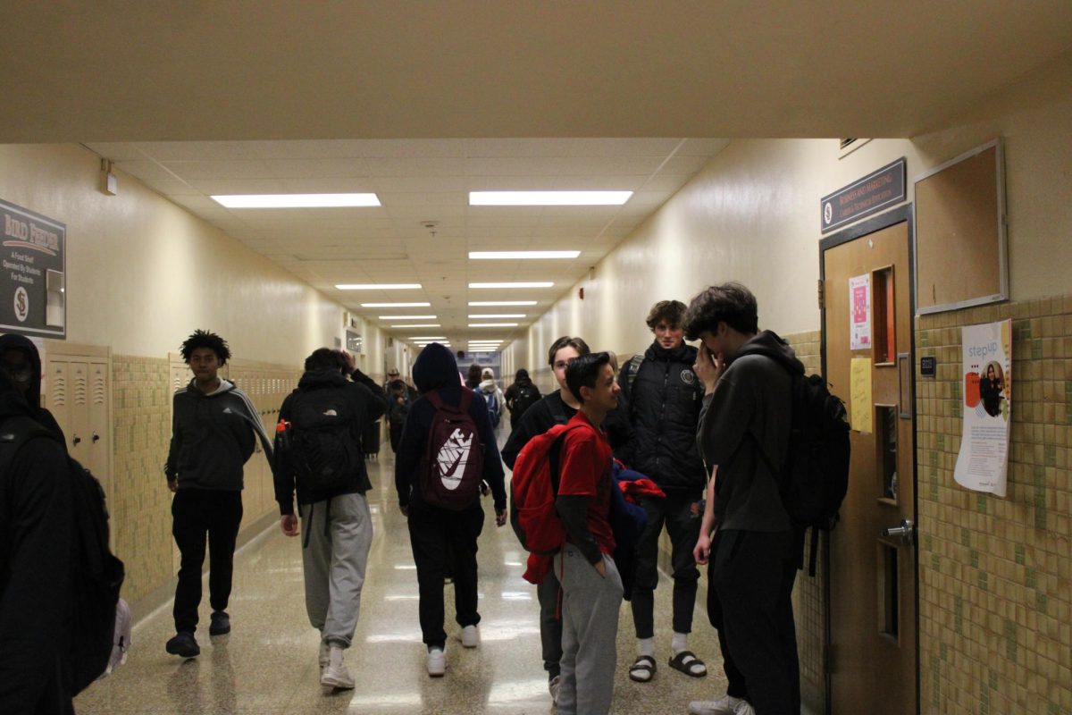 Students walk to class in between periods six and seven. Students get used to their new classes Feb. 8. 
