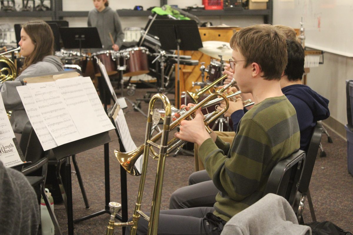 Sophomore Alex Liska practices the trumpet March 8. The band received a grant from GTCYS.