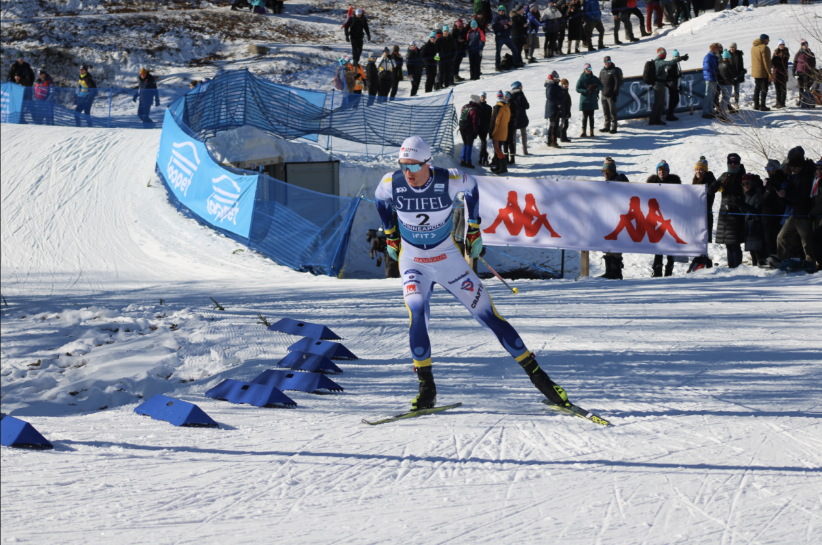 Sweden’s skier Oskar Svensson races to the top of the hill with another 7.5K to go Feb. 18. Svensson finished in 60th with a time of 22:42.8.