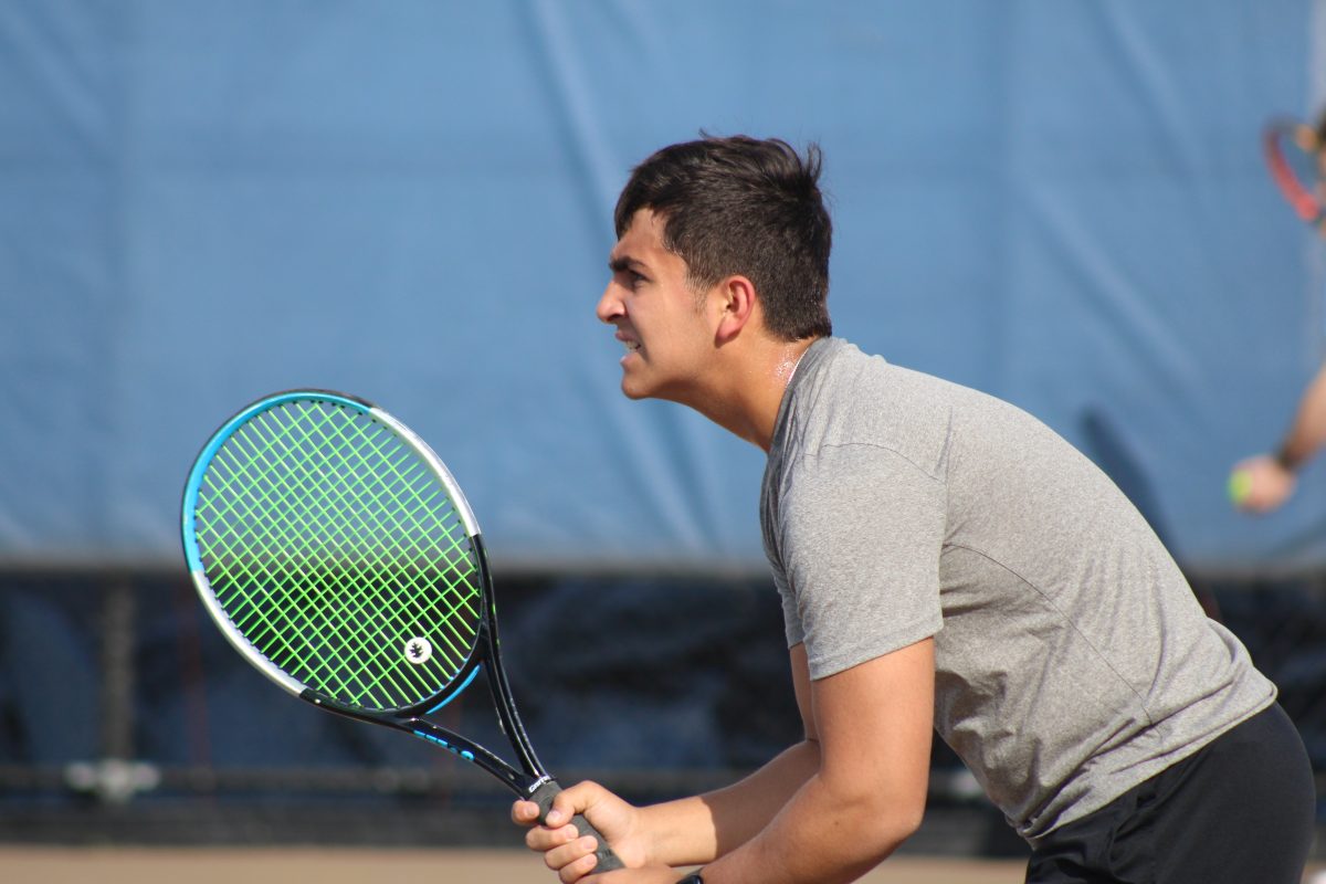 Junior Josh Fink awaits the serve from Chanhassens boys tennis team Apr. 11. Park boys swung into the season with a tough loss against the Storm.