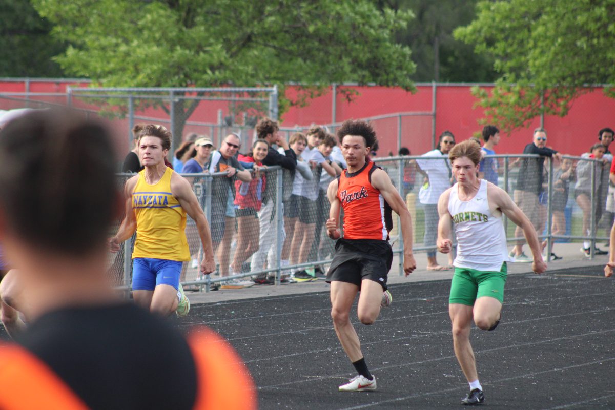 Junior Cordell Burden running at track and field sections at Armstrong High School May 28. Birden ran an 11.10 in the 100-meter dash, getting 3rd place.