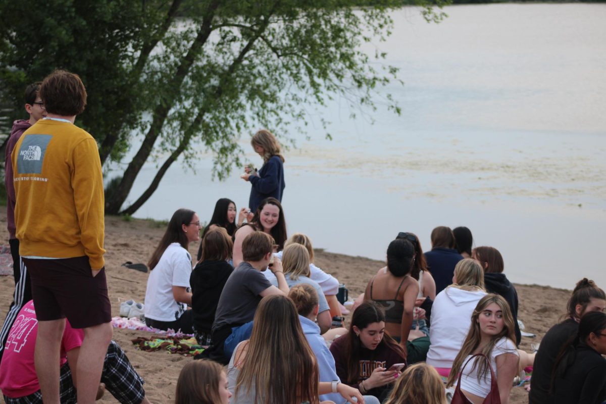 Seniors gather at Cedar Point beach May. 30. Students bond over their time spent in highschool.