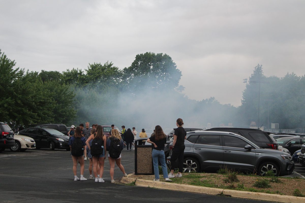 Seniors+gather+in+parking+lot+May+31.+The+seniors+pranked+younger+students+by+vandalizing+their+cars.
