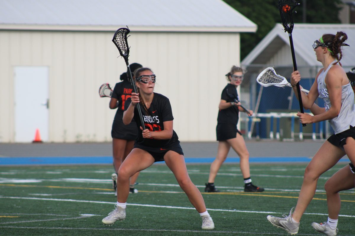 Junior Kate Grimm prepares to defend against a Hopkins player May 28. Park lost 13-8 to Hopkins in a loss that ended Parks season