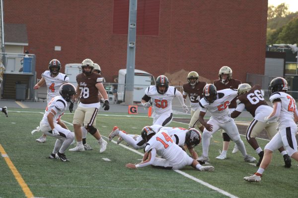 Park's defense brings down Apple Valley's running back in the first quarter Sept 13. Park won the game 35-28.