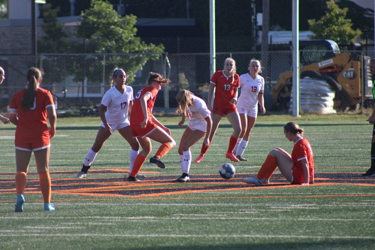 Junior Audrey Martin clears the ball for the Orioles on Sept. 16. The girls lost to rival team Benilde St. Margarets 0-3.