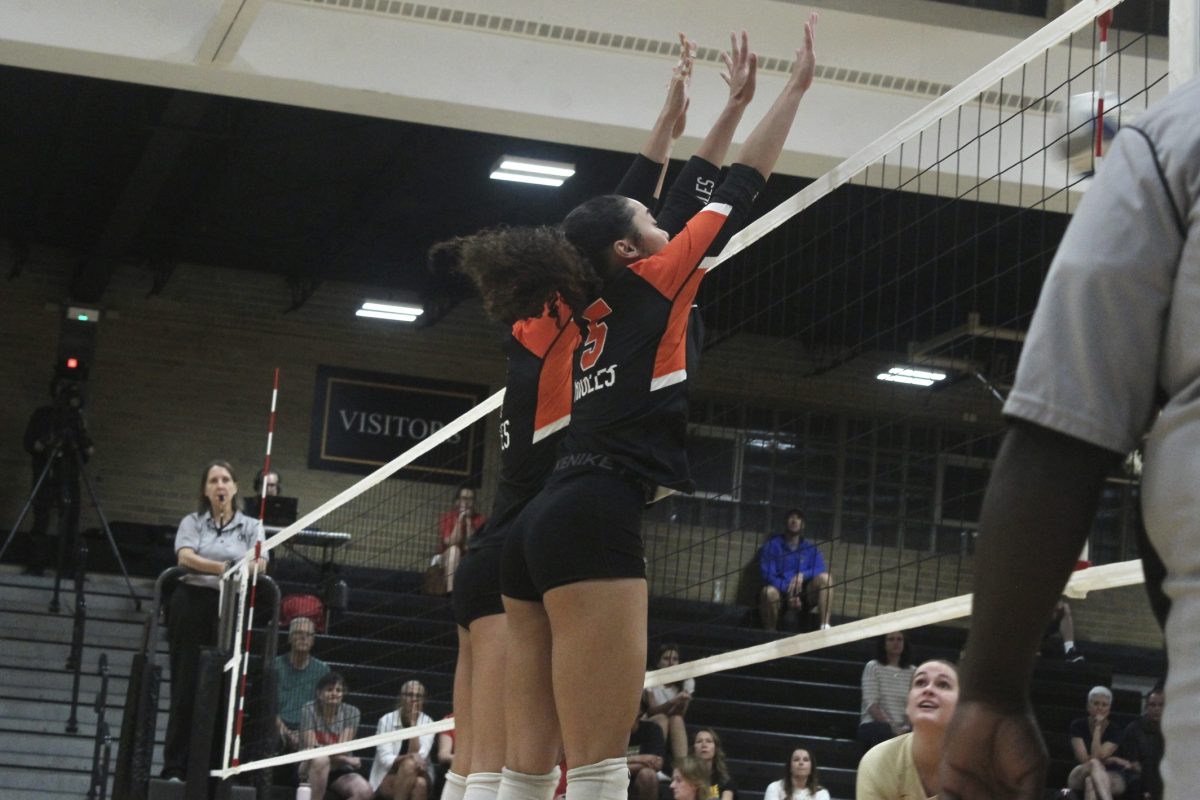 Senior Amara Schroeder goes for the block Sept. 17. Park took a clean sweep, beating Two Rivers 3-0.