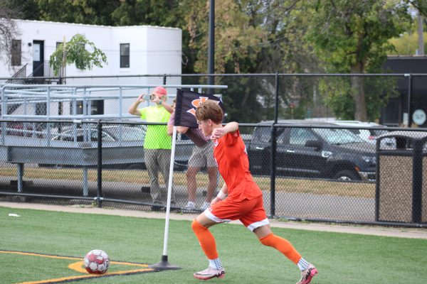 Senior Elijah Proost sets up for a corner kick Oct. 5. Park tied Washburn 2-2.