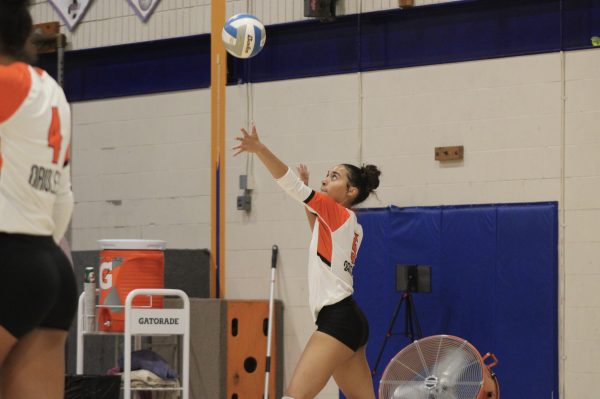 Senior Amara Schroeder serves the ball against Washburn Sept. 23. Schroeder is one of Park's captains.