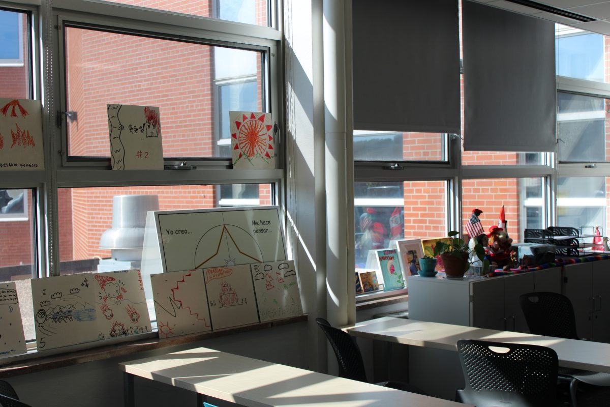 Drawings of students interpretations of different omens found in a story displayed in Hanna Anderson's AP Spanish Literature and Culture class on Sept. 17. Anderson's room was one of the many classrooms revamped over the summer with a switch from individual desks to many small tables and a digital whiteboard.