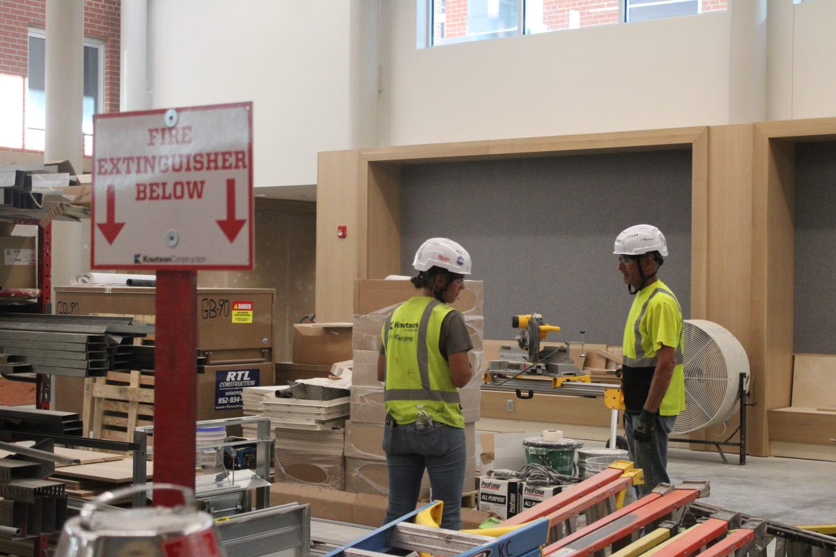 Two construction workers discuss their next move Sept. 25. Park has undergone construction over the past two years, but it isn't finished yet.