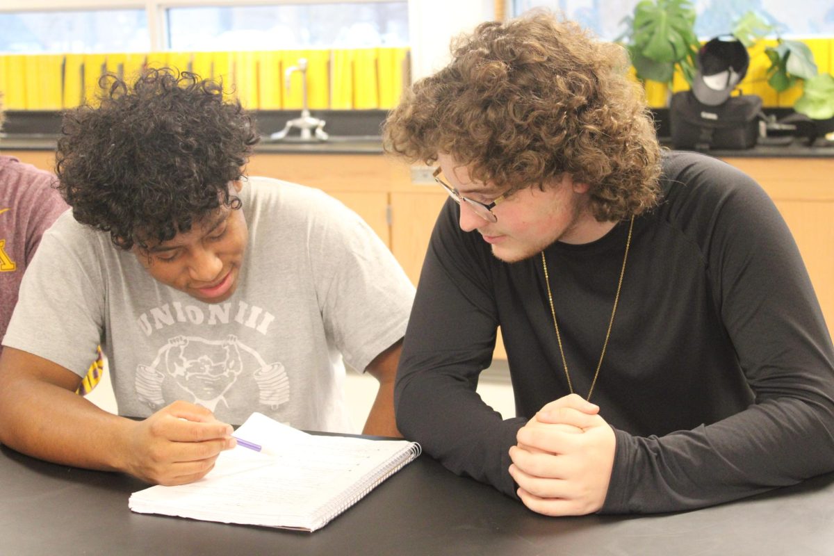 Senior Jordan Greene and Junior Jaxon Govier collaborate on an assignment Nov. 21. As the year progresses, maintaining focus remains crucial for seniors in mixed-grade classes.