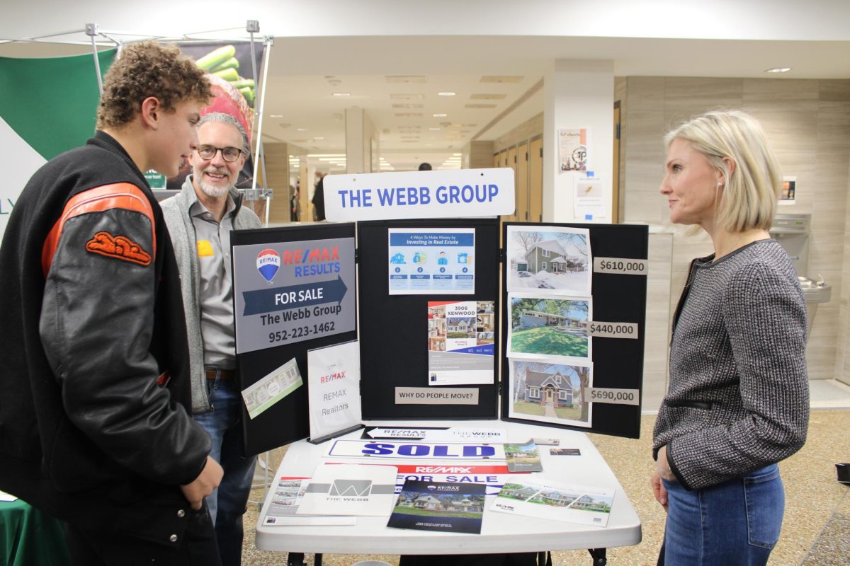 Sophomore Axel Smith explores post-high school opportunities at the career fair Nov. 21. This event was organized by Park to help guide students in their future career paths.