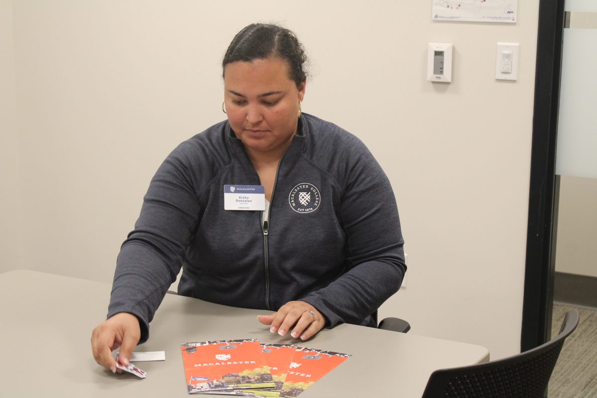 Macalester representative Aisha Gonzalez holds an informational session Oct. 9. Park invites college representatives to help inform students on their options.