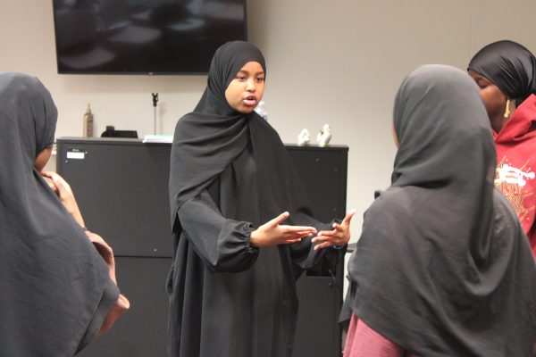 Freshman Anisa Farah discusses with her club what dance they should practice in c350 Nov. 6. This is one of many dances they do in the culture club.