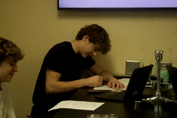 Sophmore Finn Brooberg works on chemistry homework Oct. 30. He used the new 'Win Wednesdays' to prepare for an upcoming AP chemistry test.