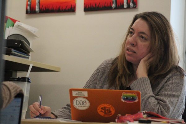 Senior counselor Heidi Cosgrove talks during a meeting in her office Dec. 11. Cosgrove helps seniors with college applications and decisions like applying early action versus regular decision.