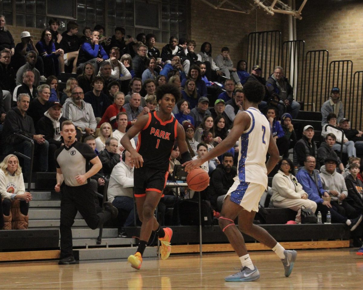 Senior Micah Curtis sizes up his defender before he attempts to score Dec.17. Park lost to Wayzata 101-69.