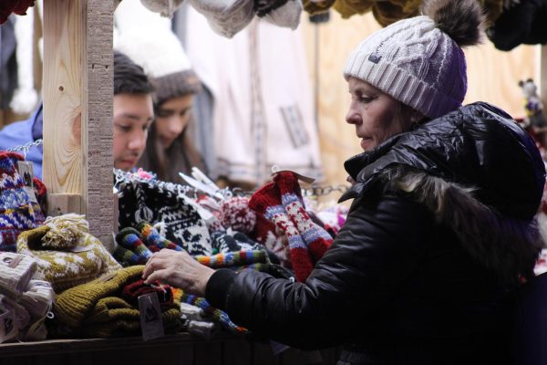 A shopper looks at handmade crafts Nov. 23. Minneapolis opened its Christmas Market, where small businesses can showcase their goods.