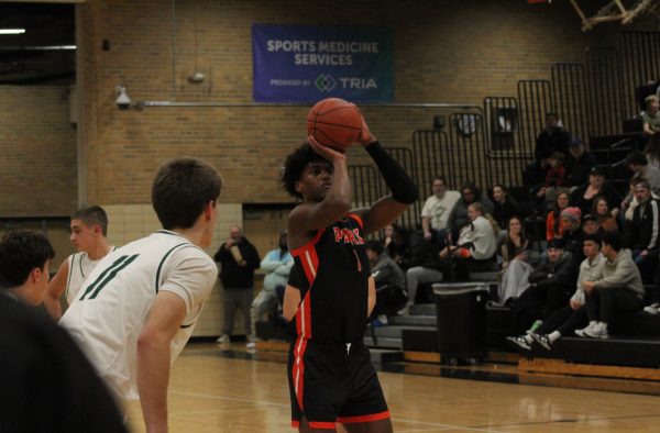 Senior Micah Curtis lines up for a free throw Dec. 10. Park beat Holy Family 88-53.