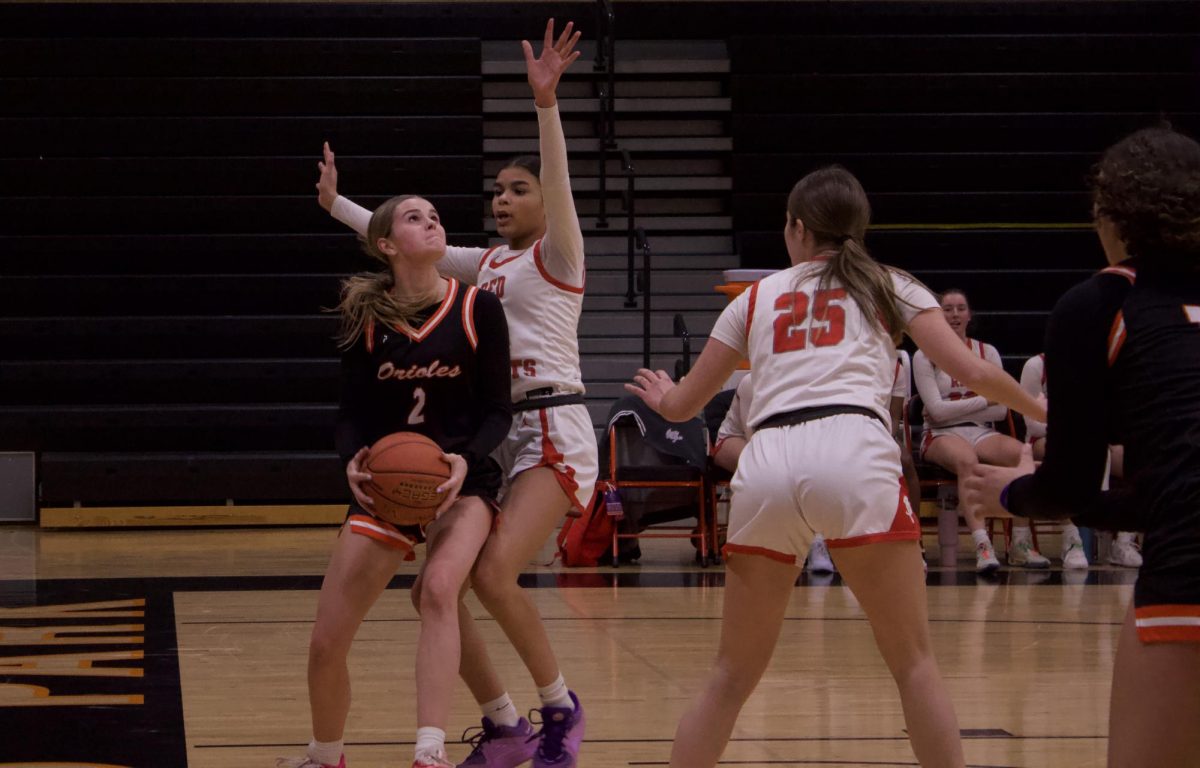 Senior Gabby Fadden drives to the basket in hopes of scoring the team two points Jan. 7. Park lost to Benilde-St. Margret's 29-101.