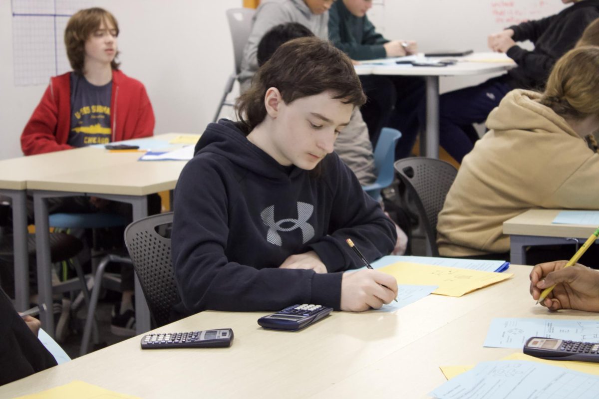 Freshman Gavin Thompson works on an assignment in Kari Taylor's math class Jan. 10. Many teachers reviewed classwork after the long break.