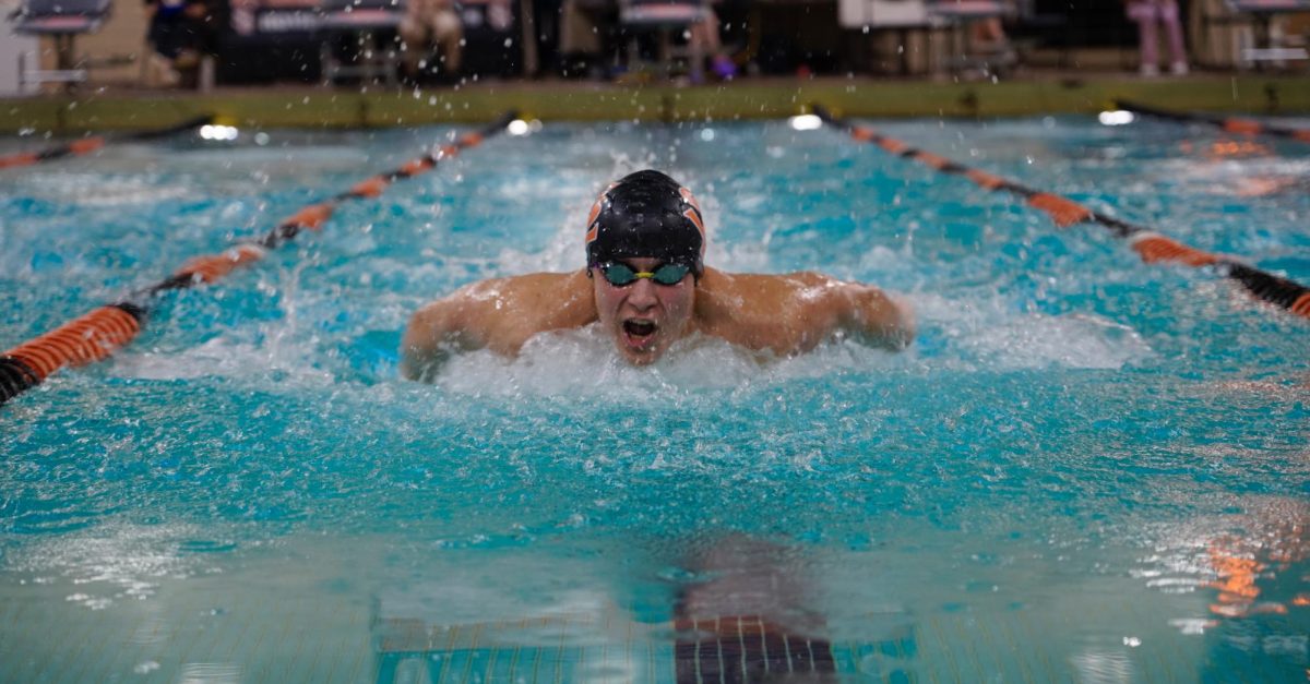 Freshman Axel Smith races down the center of the lane Jan. 16. This was Park's fourth dual meet of the boy's swim season.