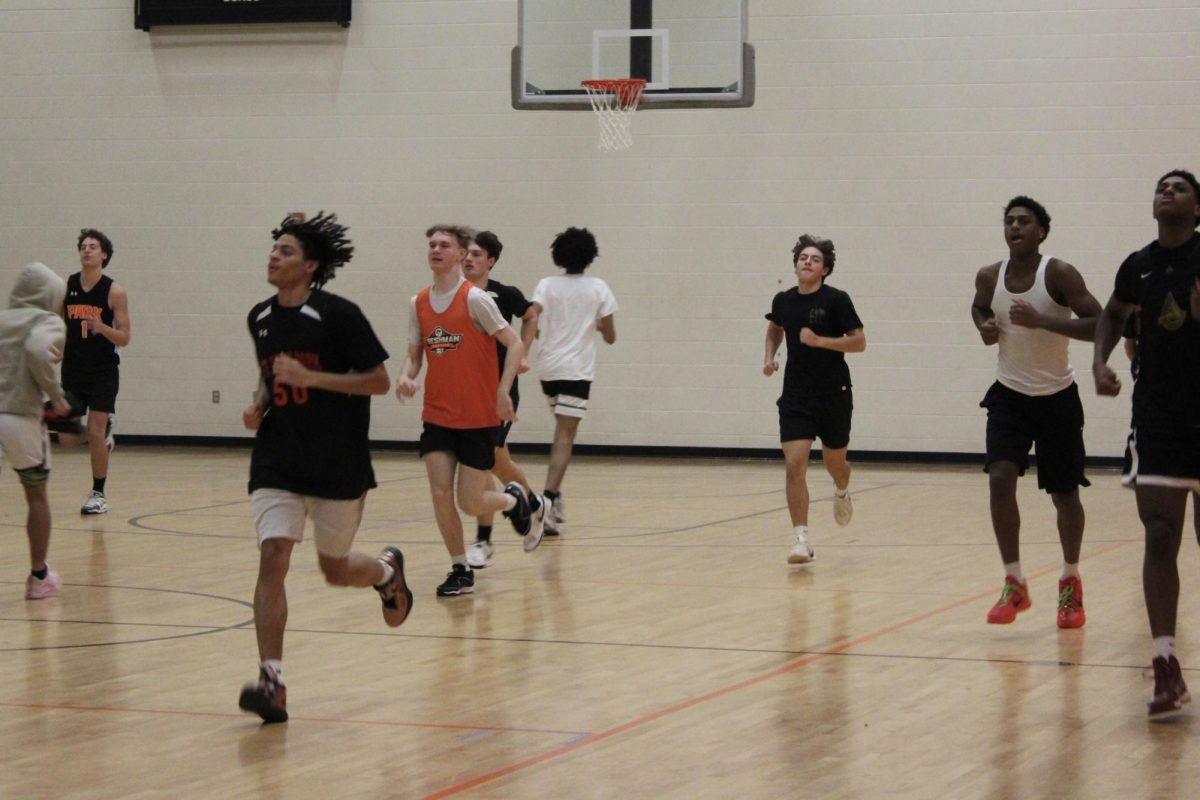 Park's various basketball teams practiced and warmed up for practice Dec. 18. The lack of gym space has caused more crowded practice areas.