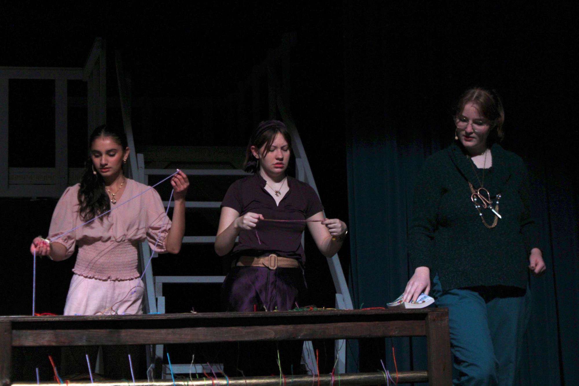 The cast of “String” performs a scene introducing the characters of the Greek Fates Nov. 12. Performances ran from Nov.13 to Nov. 22.