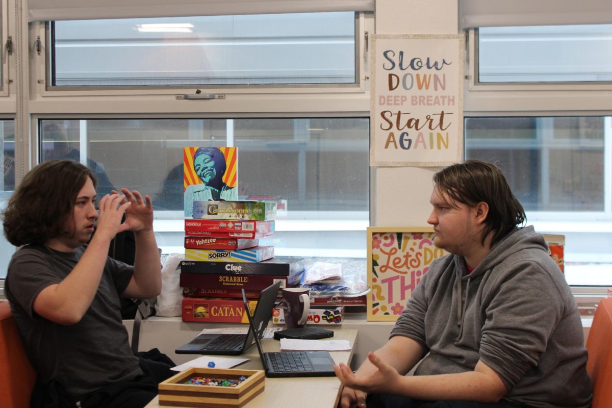 Seniors Keaton Leonard and Charlie Rach establish their campaign setting at Dungeons and Dragons club Dec. 3. The club is held every WIN Wednesday, where members separate into 3 different campaigns.