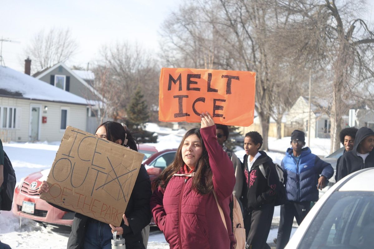 Students chant against the occupation of Twin Cities by ICE Jan. 20. Led by SOAR members, students responded to various chants throughout the walk hundreds of students vocalize at this Anti-ICE demonstration.