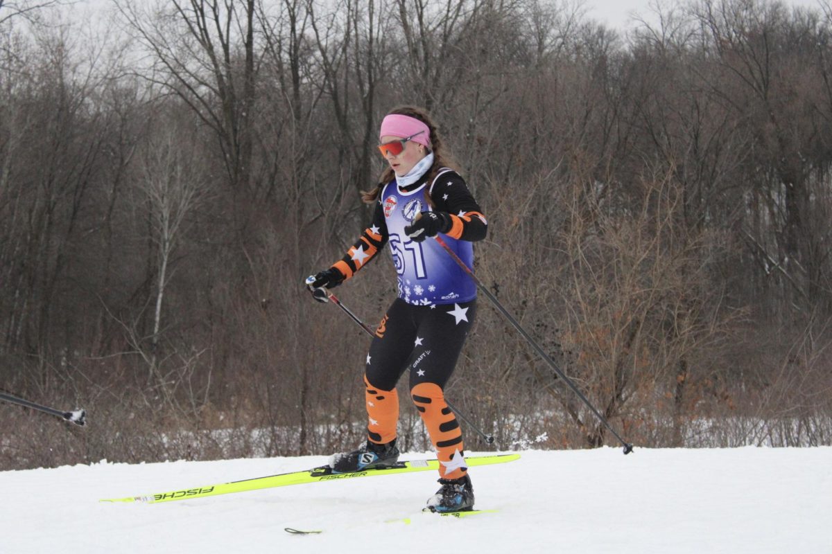 Junior Laura Anderson skis along the trail at Theodore Wirth. Girls' varsity placed fifth during their race Jan. 7.