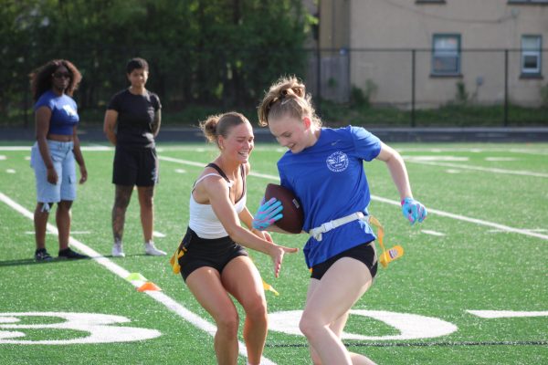 Senior Claire Williams and sophomore Elsa Zondervan practice drills and run-throughs together May 15. Their teamwork and preparation is crucial for securing wins for the rest of their season.