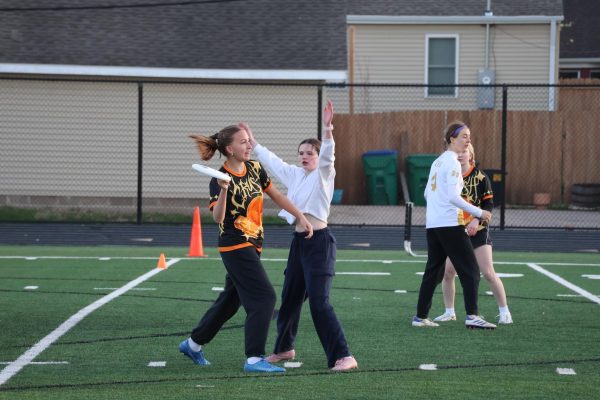 Junior Ella Evans prepares to pass the disc to a teammate April 28. Park lost 6-10 against Apple Valley.
