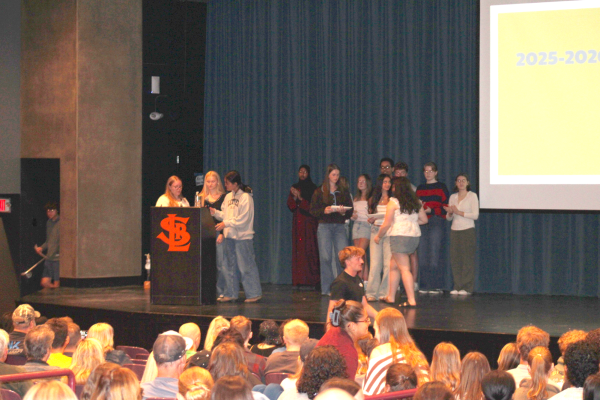 New officers, rising seniors Anya Lind-Ayres, Lucille Burgeson, and Tenzin Pedon, announce the names of the new inductees May 20, while Celia Slattengren and Asha Ferrán-Sapatnekar hand out the official certificates. The induction ceremony was a way to showcase the hard work of National Honor Society students throughout the year, and it allowed past and present officers to join together for a well-deserved celebration of success. 