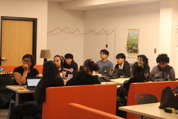 Students participating in Non Traditional Academy (NTA) listen to a presentation about an upcoming project where they are expected to connect math, science, English and social studies with a focus on hands-on learning April 29. NTA is one of the programs at Park that will be impacted by the upcoming cuts, limiting access to alternative styles of education for Park students.